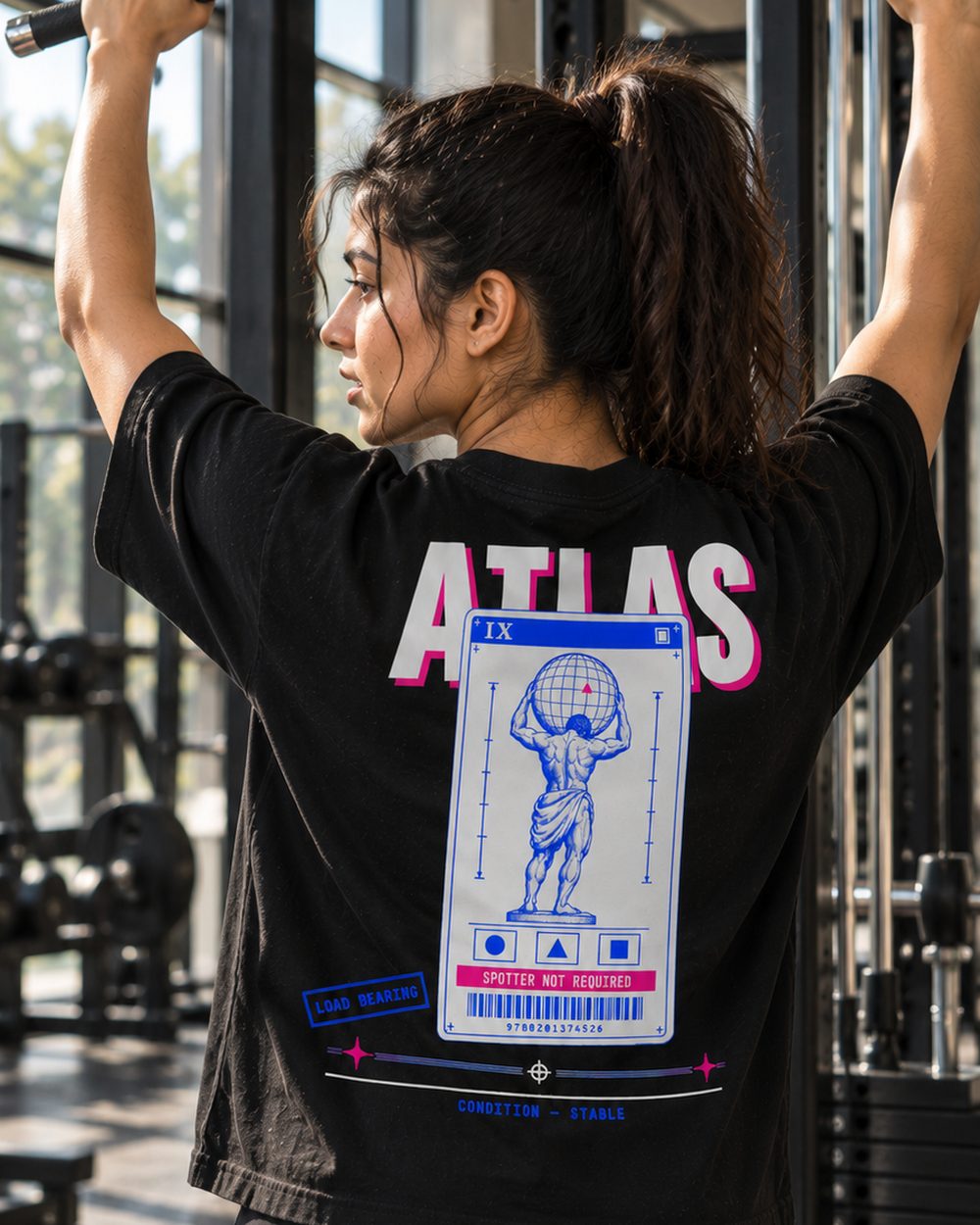 Atlas tee, full back print, gripping a pull-up bar