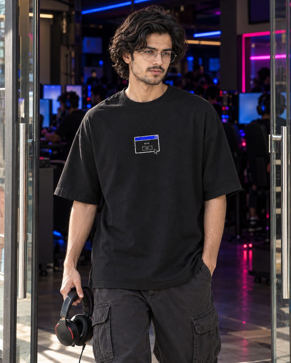 Not Responding tee, dialog-box chest print, walking through a glass door with headphones